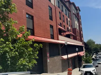 Building brick awning, project building in New York