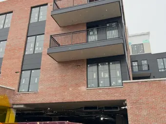 Building brick balconies, project building in New York