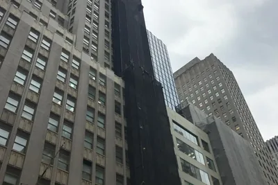 Facade netted elevation midtown, facade renovation, Manhattan, NY