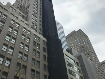 Facade netted elevation midtown, facade renovation, Manhattan, NY