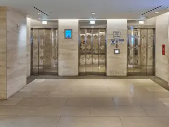 Interior elevator bank, world diamond tower lobby renovation, 580 Fifth Avenue at 47th Street, Manhattan