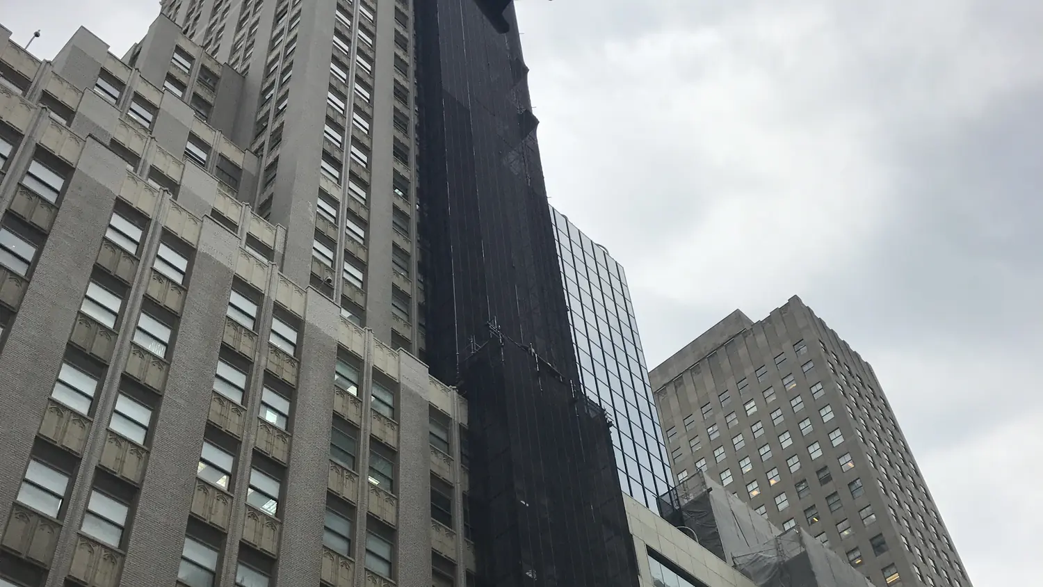 Local Law 11 facade repairs underway from scaffolding on a New York City high rise
