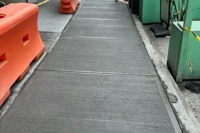 Sidewalk shed walk, sidewalk and curb work in New York